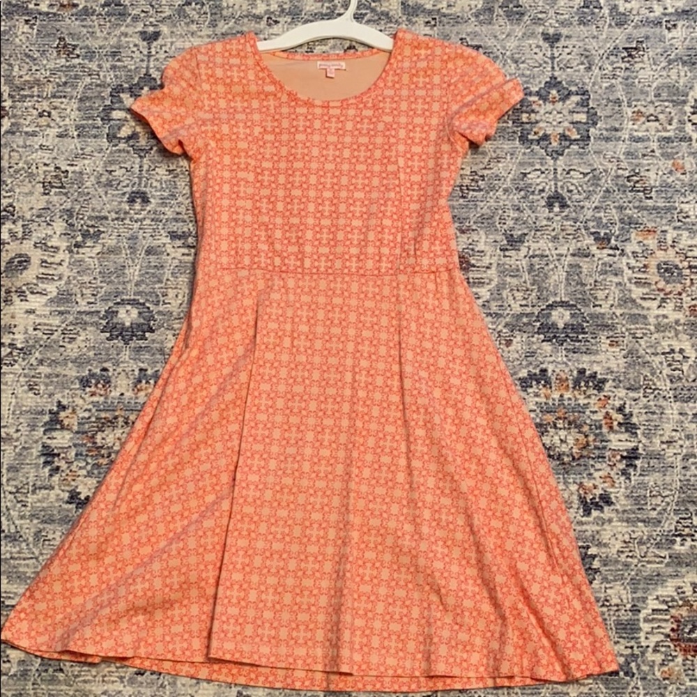 Peach Colored dress suitable for any occasion.